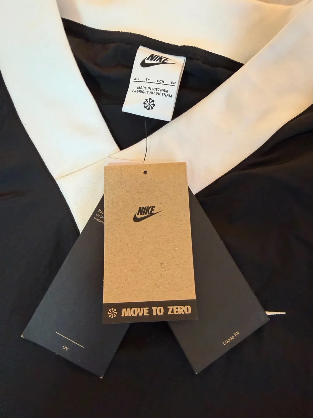 Nike Sportswear Essential Women's Loose UV Woven Long-Sleeve V- Neck sweater top